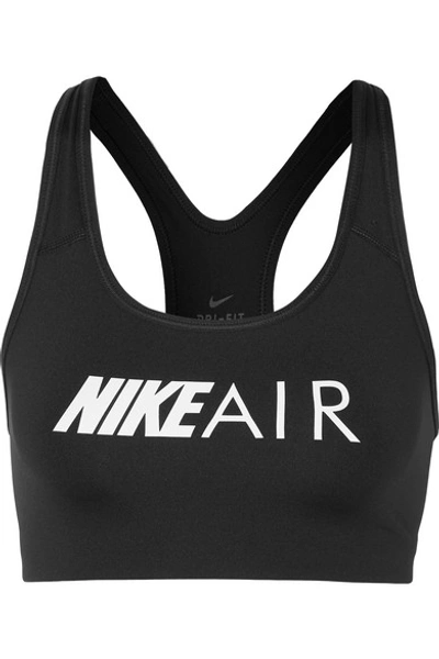 Shop Nike Swoosh Printed Dri-fit Stretch Sports Bra In Black