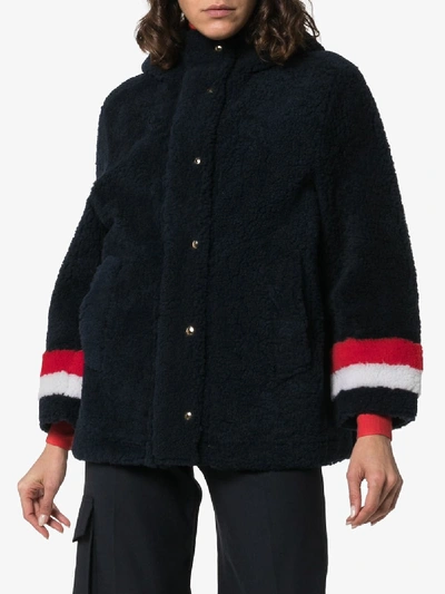 Shop Thom Browne Reversible Hooded Shearling Coat In Blue