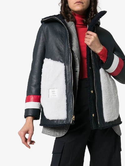 Shop Thom Browne Reversible Hooded Shearling Coat In Blue