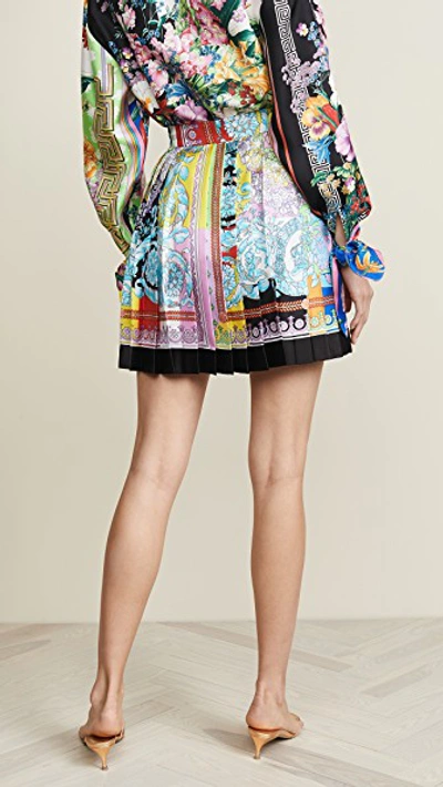 Shop Versace Pleated Miniskirt In Multi