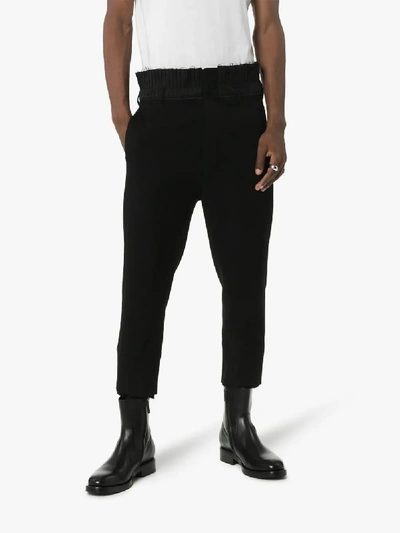 Shop Ann Demeulemeester Pleated Waist Raw Hem Cropped Trousers In 099 Black