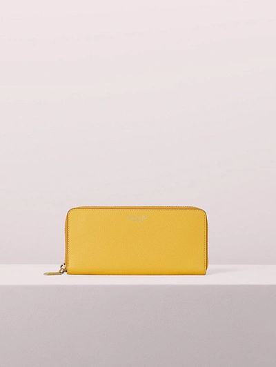 Shop Kate Spade Margaux Slim Continental Wallet In Vibrant Canary