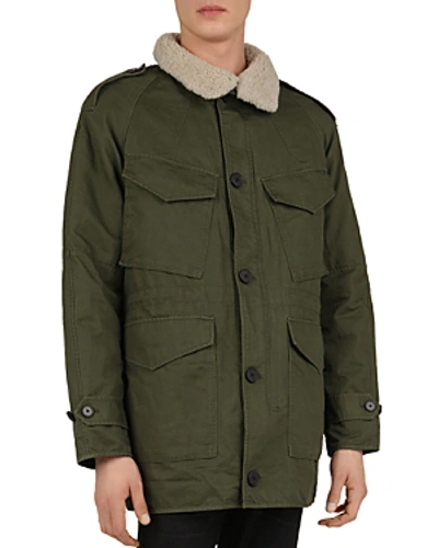 Shop The Kooples Oversized Parka With Shearling Collar In Khaki
