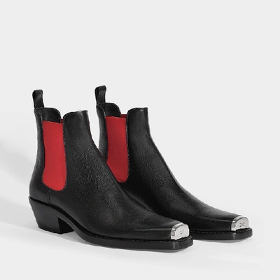 Shop Calvin Klein 205w39nyc | Western Claire Boots In Black Leather With Red Elastic
