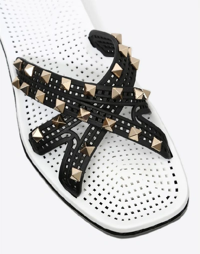 Shop Valentino Garavani Flat Slide Sandal With Crossover Straps In Black
