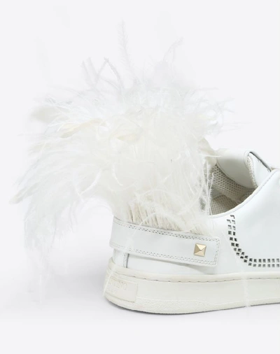 Shop Valentino Garavani Leather Backnet Sneaker With Feathers In White