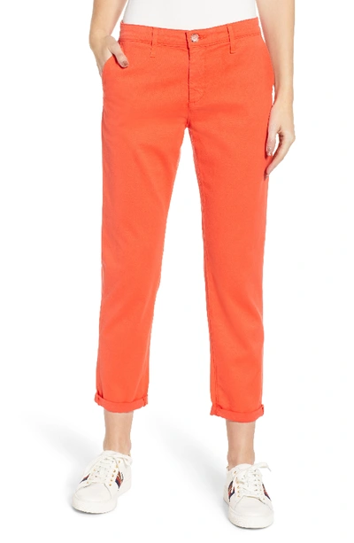 Shop Ag Caden Crop Twill Trousers In Molten Coral
