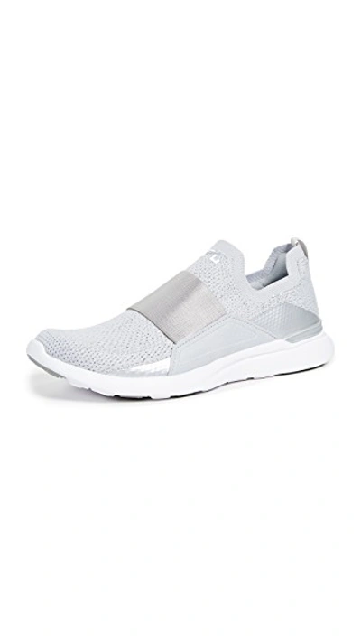 Shop Apl Athletic Propulsion Labs Techloom Bliss Sneakers In Metallic Silver/white