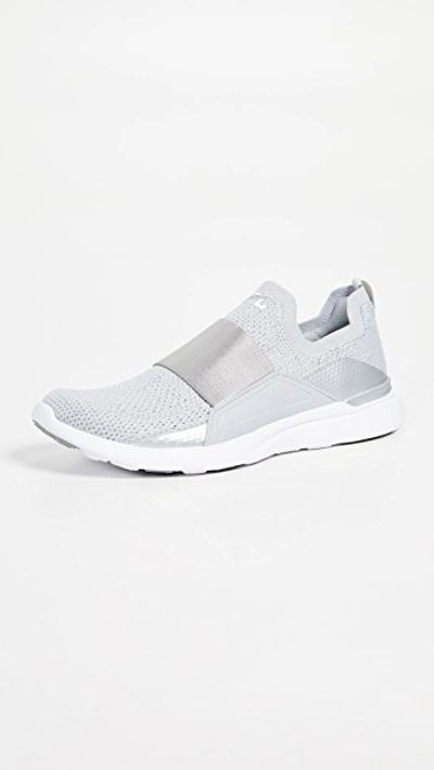 Shop Apl Athletic Propulsion Labs Techloom Bliss Sneakers In Metallic Silver/white