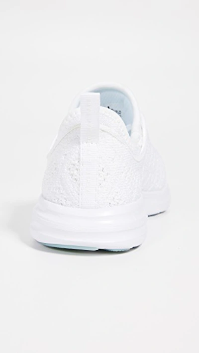 Shop Apl Athletic Propulsion Labs Techloom Phantom Sneakers In White/metallic Pearl