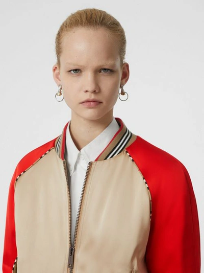 Shop Burberry Icon Stripe Detail Monogram Motif Bomber Jacket In Honey/red