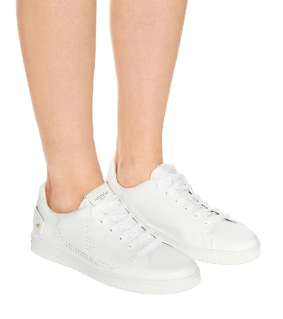 Shop Valentino Backnet Leather Sneakers In White