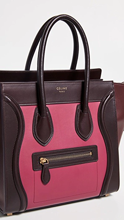 Shop Celine Micro Luggage Bag In Burgundy