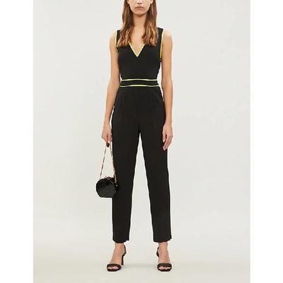 Shop Alice And Olivia Jeri V-neck Crepe Jumpsuit In Black/neon Yellow