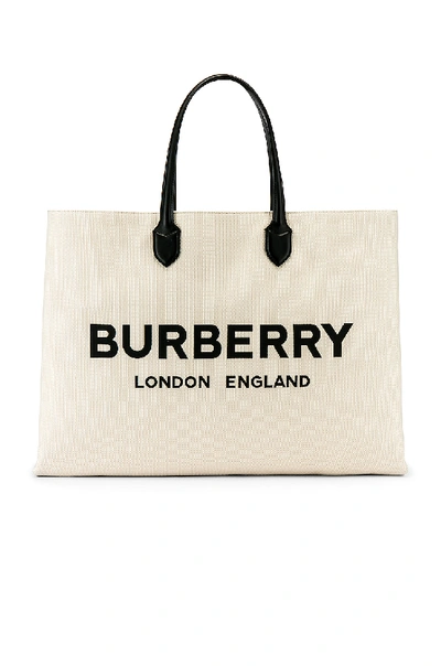 Shop Burberry Large Leather Tote In Natural