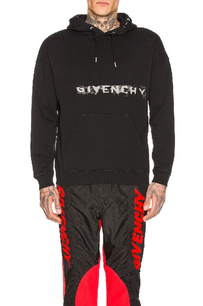 Shop Givenchy Fading Logo Hoodie In Black