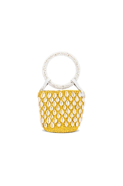 Shop Aranaz Kaia Mini Bucket Bag In Yellow.