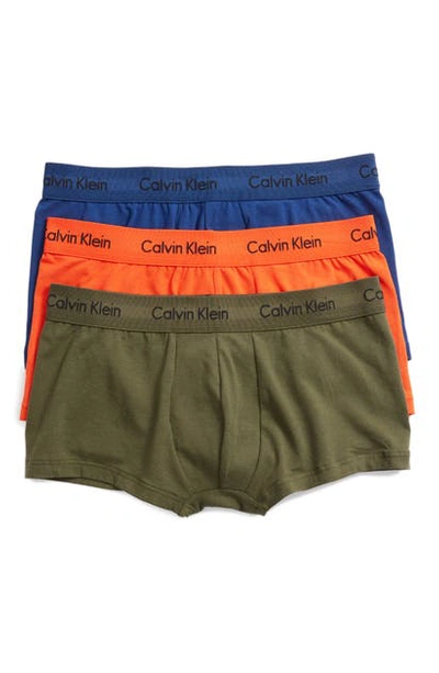 Shop Calvin Klein 3-pack Stretch Cotton Low Rise Trunks In Green/ Dark Night/ Orange