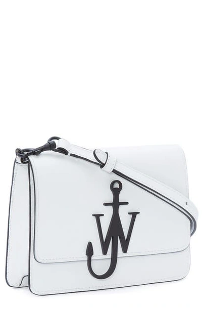 Shop Jw Anderson Logo Leather Crossbody Bag - White In White/ Black