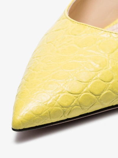 Shop Prada Yellow 65 Crocodile Effect Mules