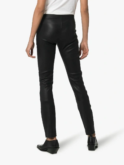 Shop Haider Ackermann Laser Cut Leather Leggings In Black