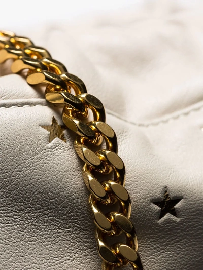 Shop Saint Laurent Cream Star Studded Chain Handle Pouch Bag In 9269 -crema Soft/oro