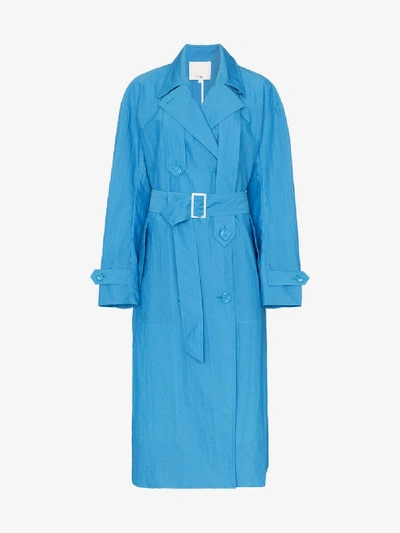 Shop Tibi Long-sleeved Belted Trench Coat In Blue
