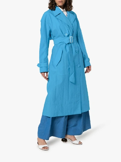 Shop Tibi Long-sleeved Belted Trench Coat In Blue