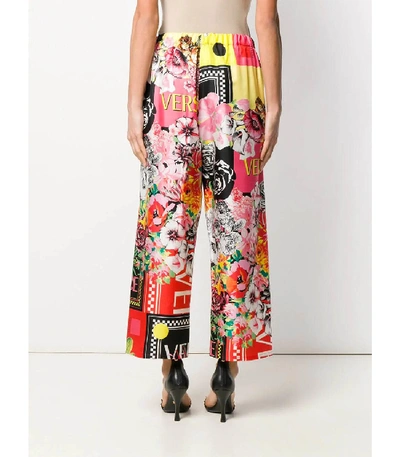 Shop Versace Silk Floral Pants In Multi