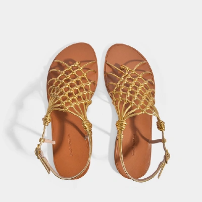 Shop Stuart Weitzman | Seaside Flat Metallic Sandals In Golfden Calfskin