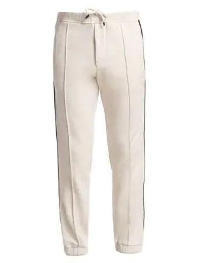 Shop Fendi Men's Zecca Logo Tape Pants In White