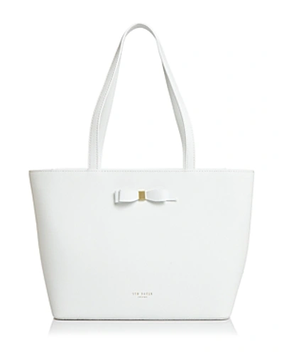 Shop Ted Baker Jjesica Bow Leather Tote In White/gold