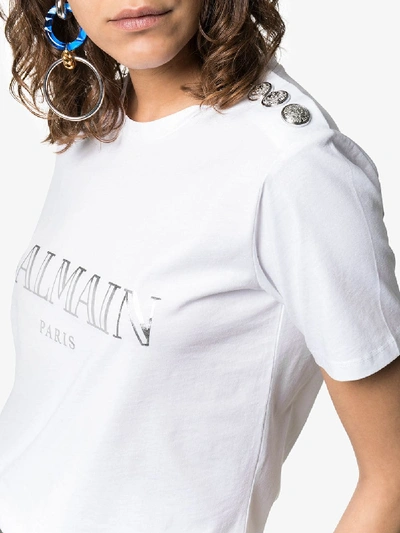 Shop Balmain Logo Print Button Detail Cotton T-shirt In Gac White