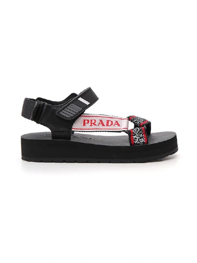 Prada Logo-embossed Rubber-trimmed Leather And Canvas Sandals In Black |  ModeSens