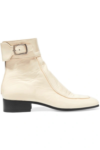 Shop Saint Laurent Miles Patent-leather Ankle Boots In Cream