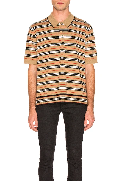 Shop Burberry Merino Stripe Polo In Camel