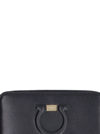 Shop Ferragamo Zip-around Leather Wallet In Black