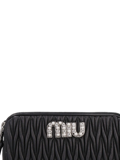 Shop Miu Miu Quilted Leather Crossbody Bag In Black