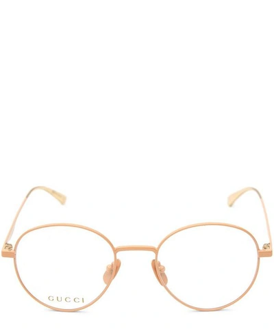 Shop Gucci Round Optical Glasses In Gold