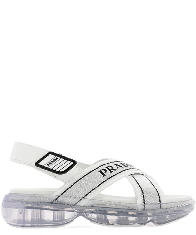 Shop Prada Logo Criss Cross Singback Sandals In White