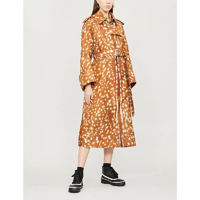 Shop Burberry Deer-print Shell Trench Coat In Honey