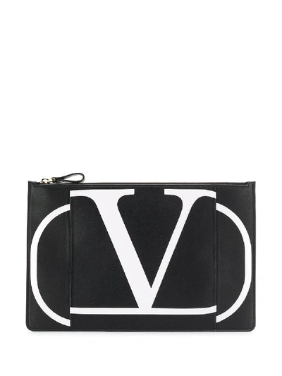 Shop Valentino Garavani Go Logo Clutch - Black