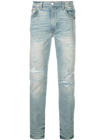 Shop Amiri Distressed Denim Jeans - Blue