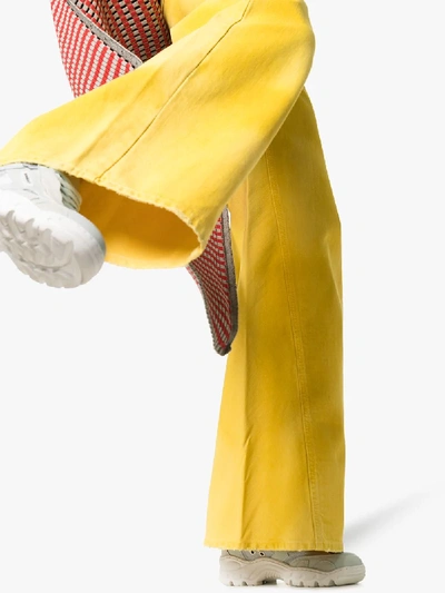 Shop Ganni Tie-dye Wide Leg Jeans In 332 Minion Yellow