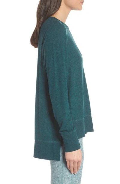 Shop Alo Yoga 'glimpse' Long Sleeve Top In Seagrass Heather