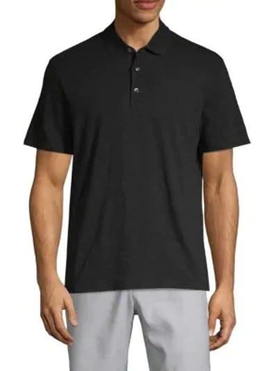 Shop Vince Men's Solid Short Sleeve Polo In Black