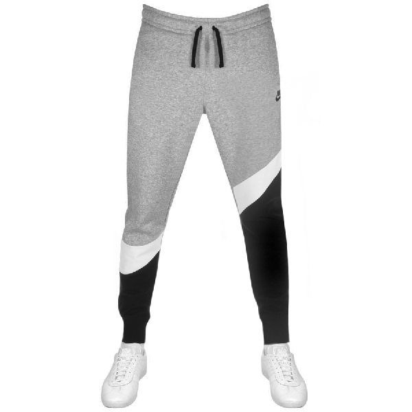nike tapered tracksuit bottoms