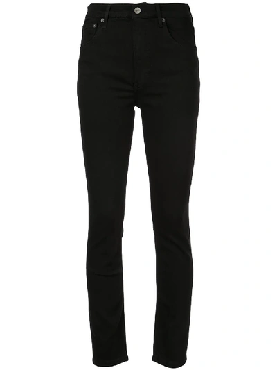 Shop Reformation High-waisted Skinny Jeans In Black