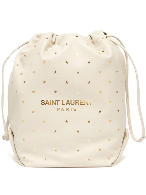 Saint Laurent Teddy Star Embossed Leather Bucket Bag In White Gold Modesens