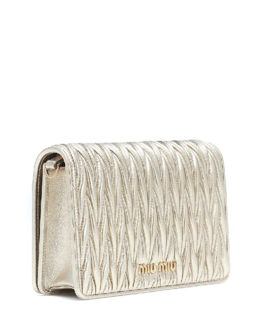 Shop Miu Miu Matelassé Leather Shoulder Bag In Gold